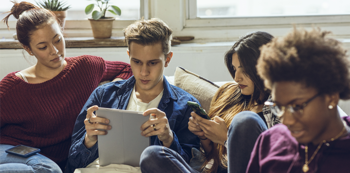 Group of friends hanging out in apartment