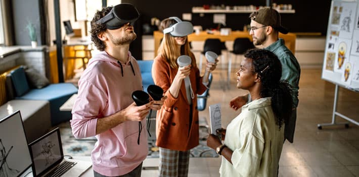 Students try out virtual reality headsets.